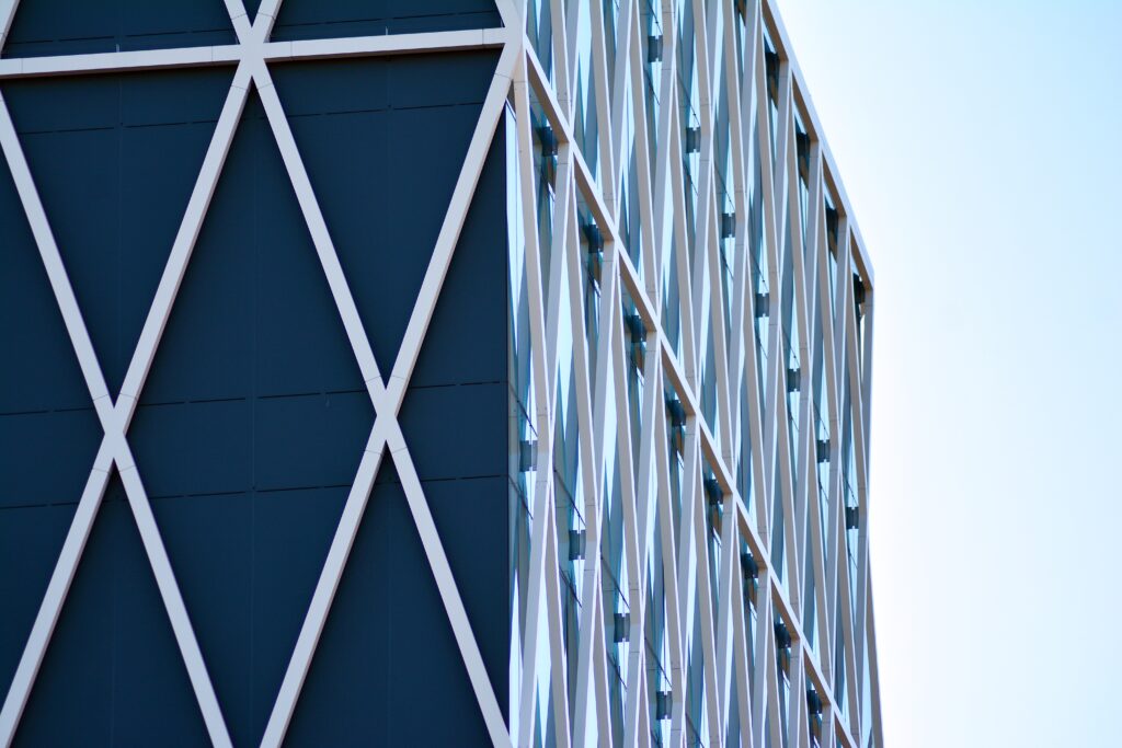 modern-architecture-with-sun-ray-glass-facade-bright-sunny-day
