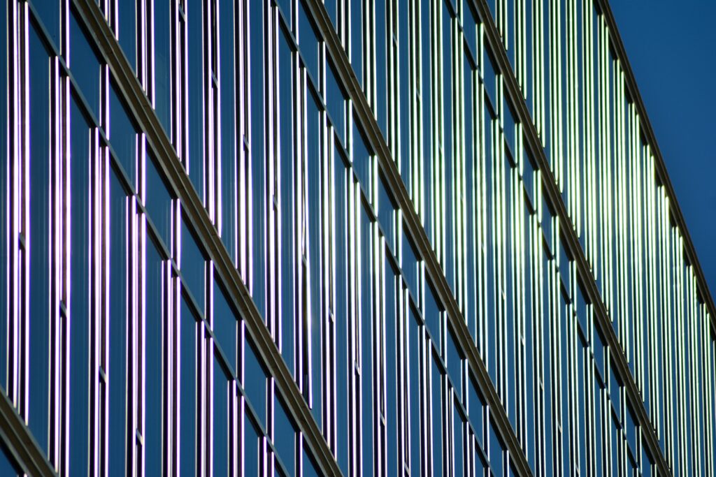 modern-architecture-with-sun-ray-glass-facade-bright-sunny-day(1)